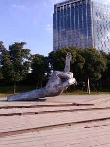 Sculpture on the Pier Along the River